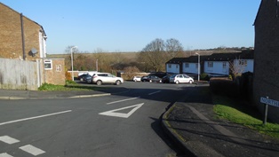 The road was built in about 1974 on land that had been part of the Payne and Trapps estate. Had this estate been built as envisaged, then Merton Avenue would have continued as far as Woodland Avenue, and there would have been a road called Porchester Crescent roughly where Northfield is today (see outline of road on German Aerial photo of 1940).